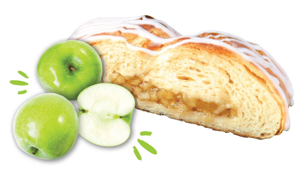 Slice of Apple pastry, with two whole green apples and one half apple next to it, and excitement lines as decoration