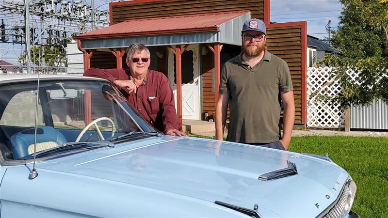 5 Star Fundraising owner Bill and his son Justin behind a 62 Ford Falcon Futura