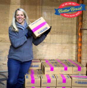 Fundraising Delivery Day - dealer with butter braid pastry boxes and butter braid logo