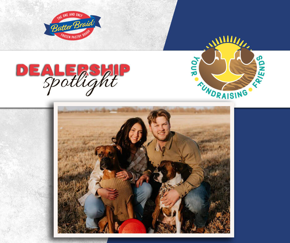 Your Fundraising Friends owners with their two boxer dogs - Dealership Spotlight with company logo