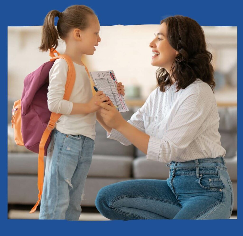 Mom motivating her daughter while she's holding a fundraiser order form