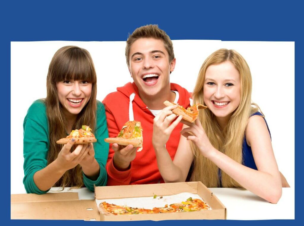 Ways to Motivate Your Sellers - three high school-aged kids eating pizza.