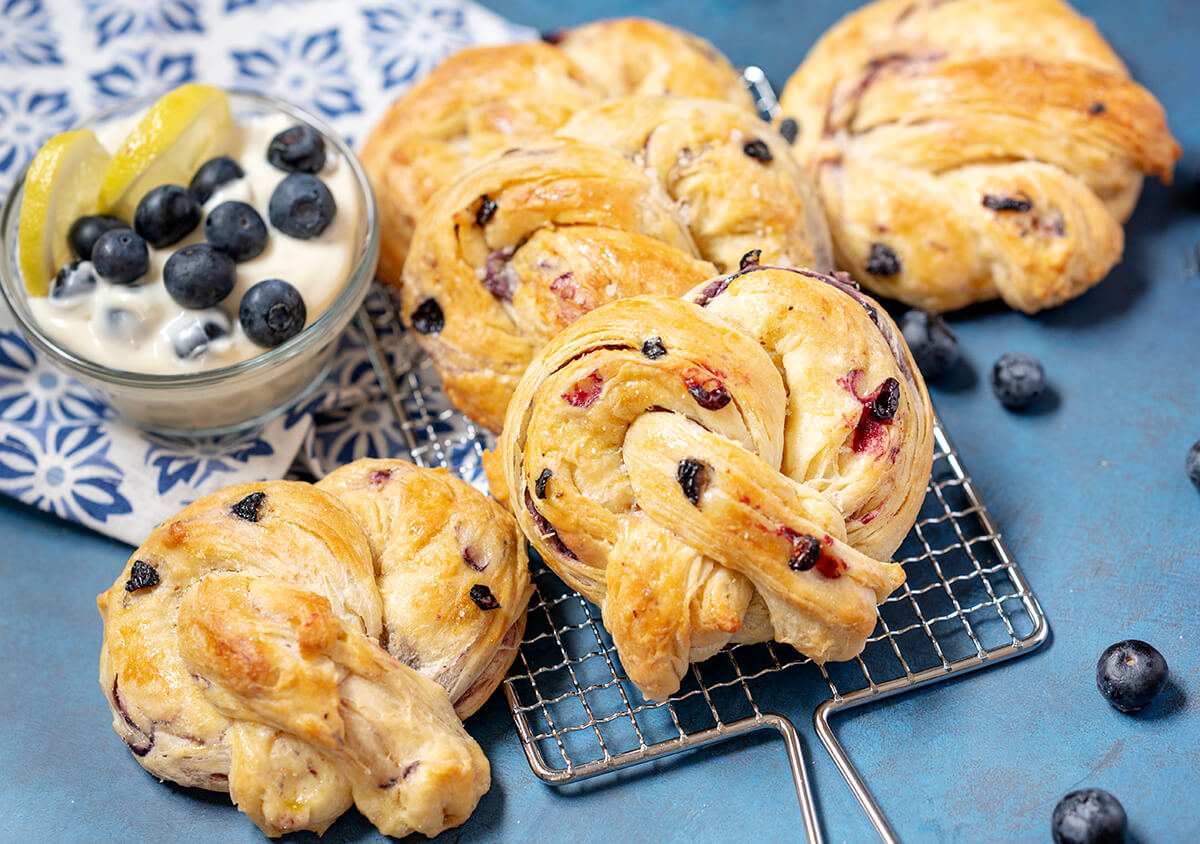 Blueberry & Cream Cheese Pretzels next to a bowl of Lemon Blueberry Dip