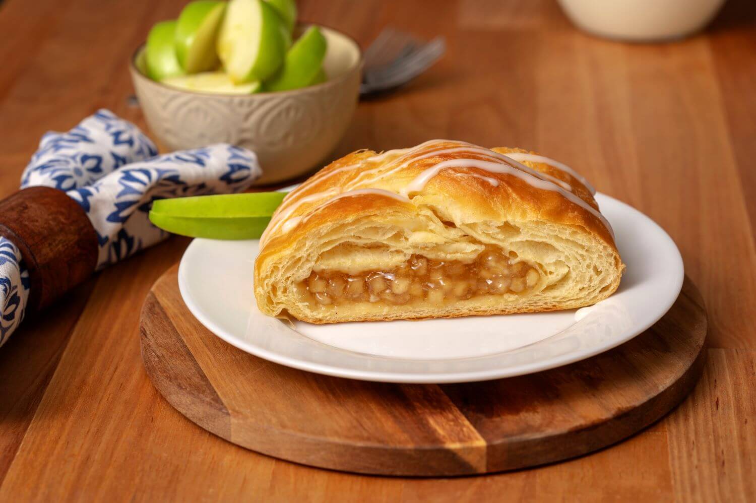 Slice of Apple Butter Braid Pastry on a plate.