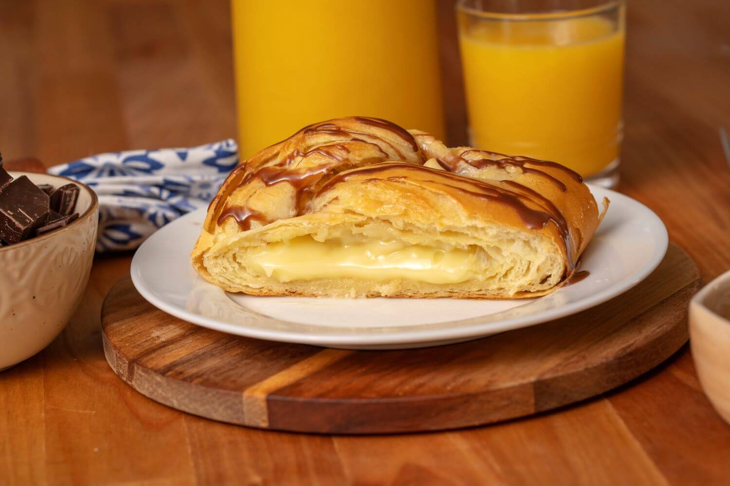 Slice of Bavarian Creme Butter Braid Pastry on a plate.
