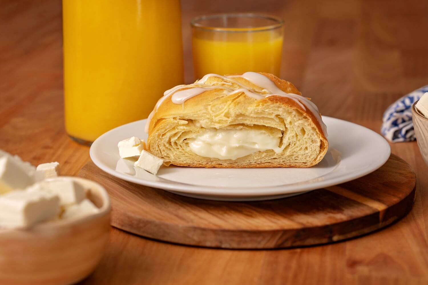 Slice of Cream Cheese Butter Braid Pastry on a plate.