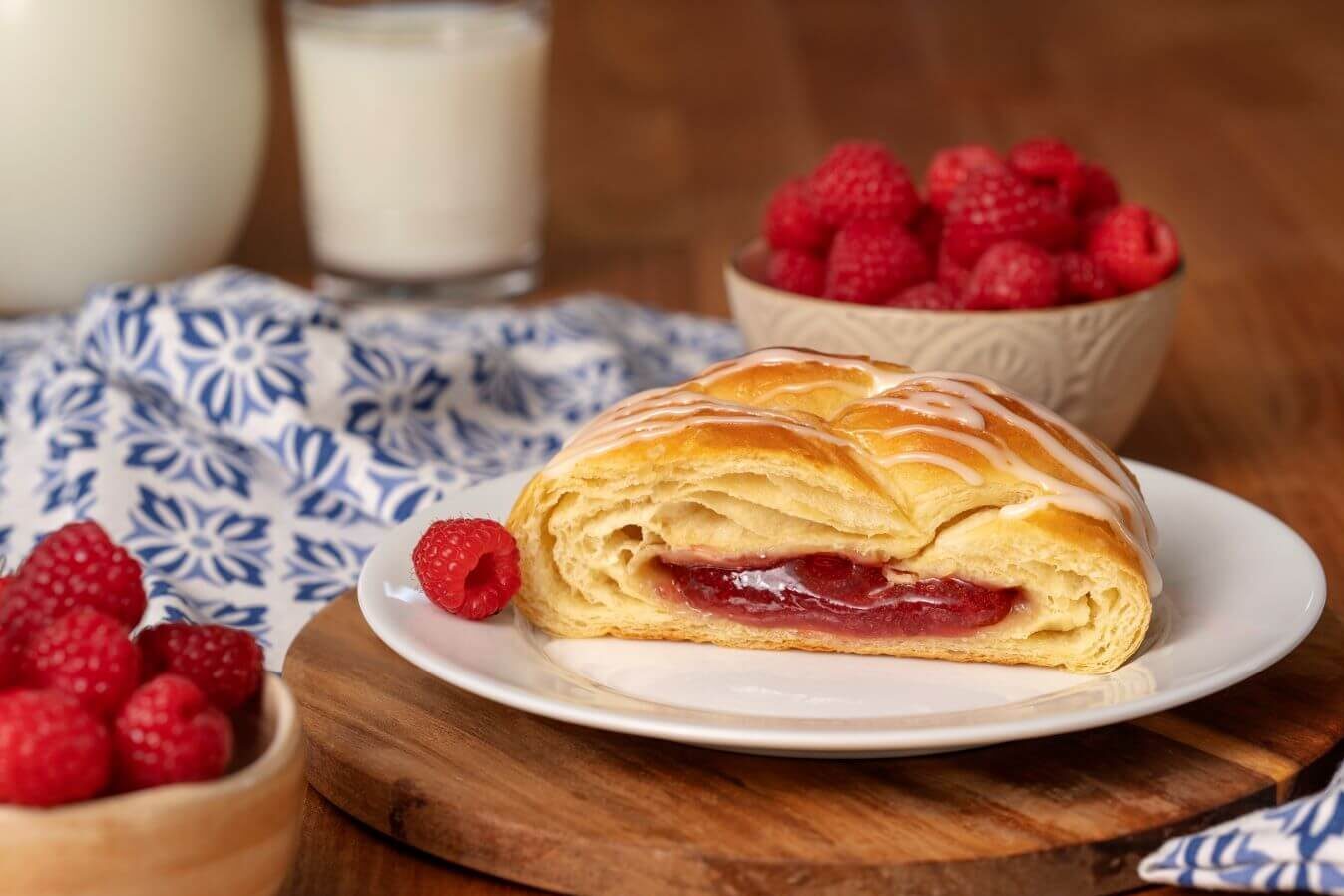 Slice of Raspberry Butter Braid Pastry on a plate.